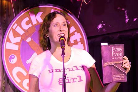 video still from Janet Kuypers reading from the book in at Spoken and Heart at Kick Butt Coffee in Austin, TX 9/15/19