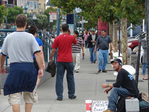 a homesless man on a street in San Francisco 9/13/09 with a sign for money that read “Why Lie - I want a Beer”
