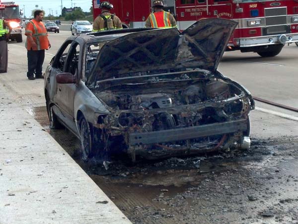 http://scars.tv/kuypers/poems/2013 photo of a car after an accident that caught on fire; photograph copyright 2013-2017 Janet Kuypers