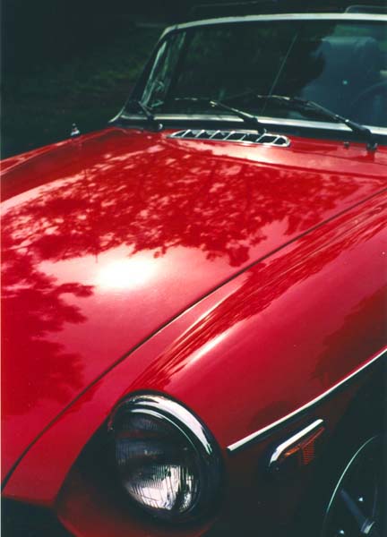 MG B red convertible, copyright © 2013 Janet Kuypers
