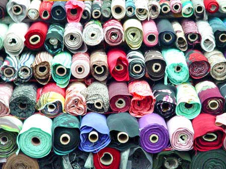 fabric rolls at a mass sale warehouse in Shanghai China in 2003