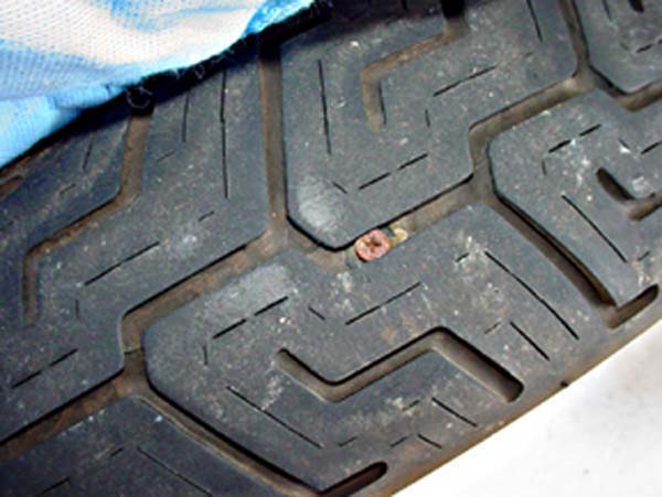 04-21-05 screw in tire 3