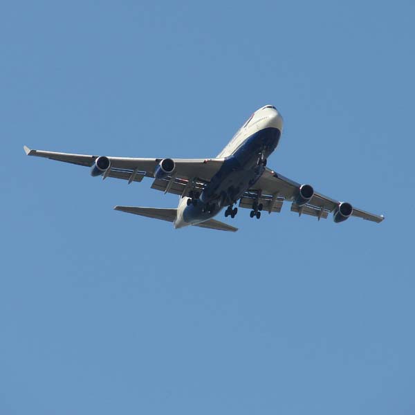 airplane overhead at Miami International Airport December 26th 2008, photograph copyright Janet Kuypers
