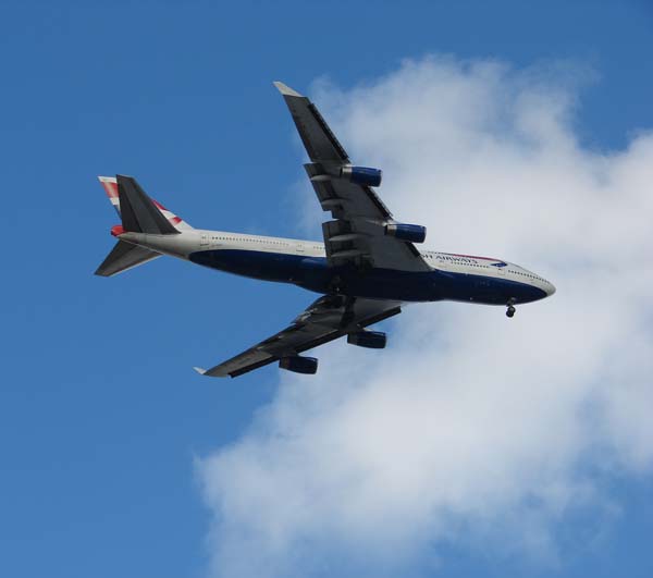airplane overhead at Miami International Airport December 26th 2008, photograph copyright Janet Kuypers