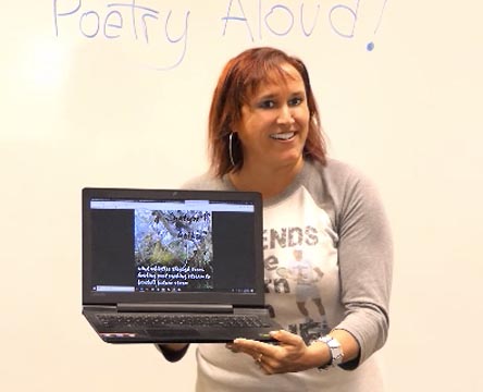 a video still of Janet Kuypers at Poetry Aloud