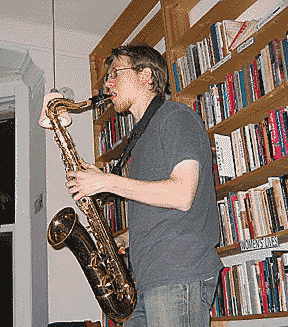 Ryan Novak playing the saxophone, live at their Chicago show 01-29-07 at Myopic Books