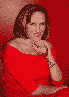 Kuypers in red with handcuffs at her wrist