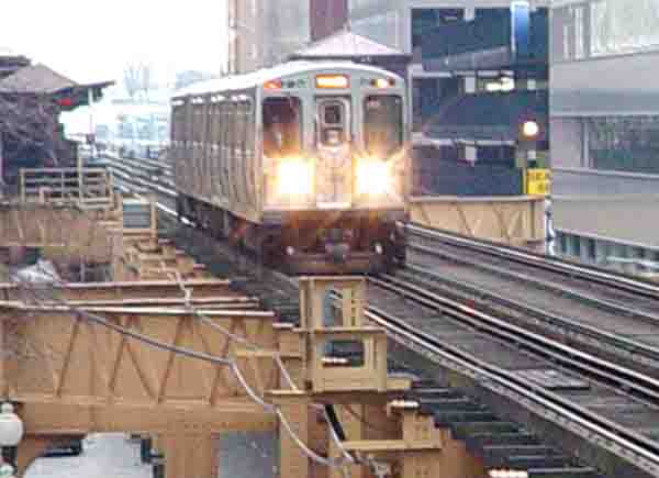 the “L” train ridin in the loop in Chicago 11/27/03 in Chicago, photograph copyright © 2003-2013 Janet Kuypers