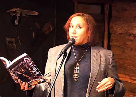 video still form Janet Kuypers reading a poem from this book at Austin’s Fort to Famous at The Buzz Mill 10/15/18