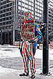 Uncle Sam at Chicago’s Sears (Willis) Tower with a sign asking for National Debt money