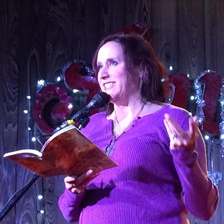 Janet with the book “Rape, Sexism, Life & Death” at Kick Butt Coffee: Spoken and Heard 1/3/16