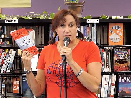 Janet with the book “Rape, Sexism, Life & Death” at Recycled Reads 10/21/17