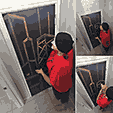 Janet at buildings door without handle